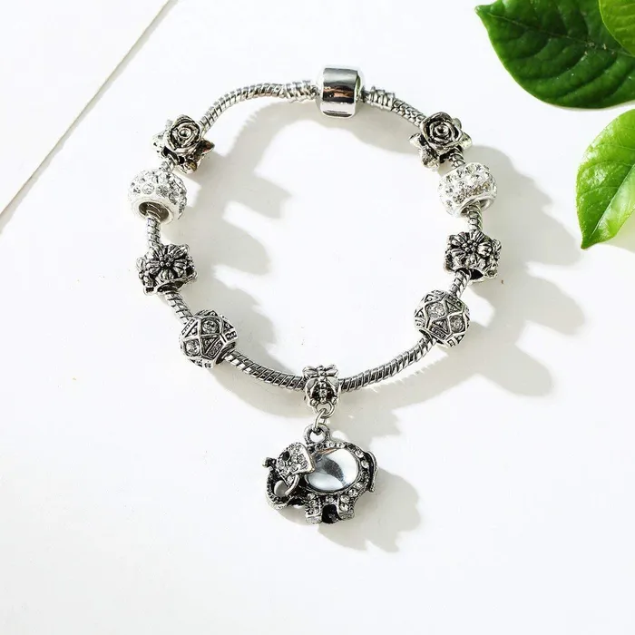 Earrings Yellow Chimes Yellow Chimes Bracelet for Women Silver Oxidised Crystal Studded Antique Floral Elephant Drop Charm Bracelet for Women and Girls