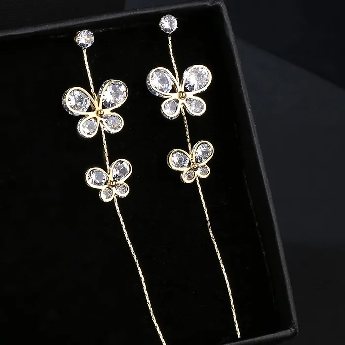 Earrings Yellow Chimes Yellow Chimes Earrings For Women Gold Tone Crystal Studded Butterfly Linear Chain Dangler Earrings For Women and Girls