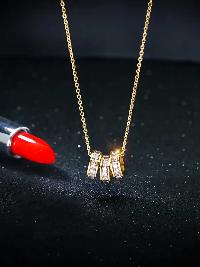 Yellow Chimes Gold Chain Pendant for Women Crystal Rings GoldPlated Stainless Steel Chain Pendant Necklace for Women and Girls Yellow Chimes Earrings