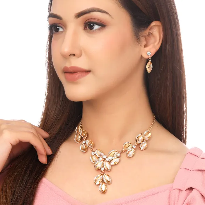 Yellow Chimes Jewellery Set For Women Gold Toned Oval Shaped Crystal Studded Necklace Set With Earring For Women and Girls Yellow Chimes Necklaces