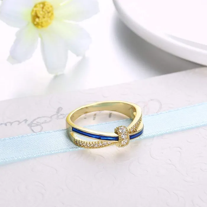 Yellow Chimes Necklaces Yellow Chimes Rings for Women Romantic Love Knot Prong Setting 18K Gold Plated White Crystal and Blue Colore Ring for Women Girls Size US 6
