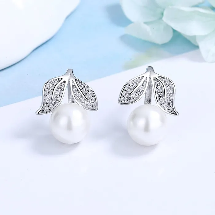 Yellow Chimes Rings Yellow Chimes Earrings for Women and Girls Silver Crystal Stud Earrings for Women Silver Toned Pearl Leafy Shaped Studs Earrings Birthday Gift for girls and women Anniversary Gift for Wife